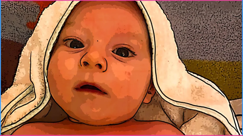 Baba törölközőbe bugyolálva