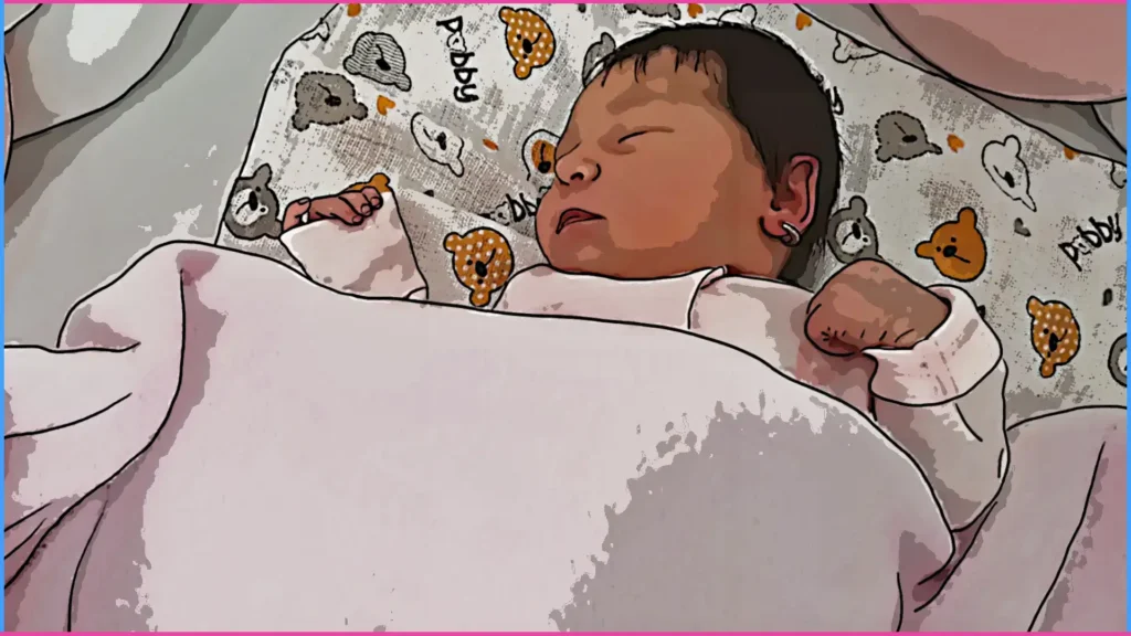 Kiságyában alvó baba