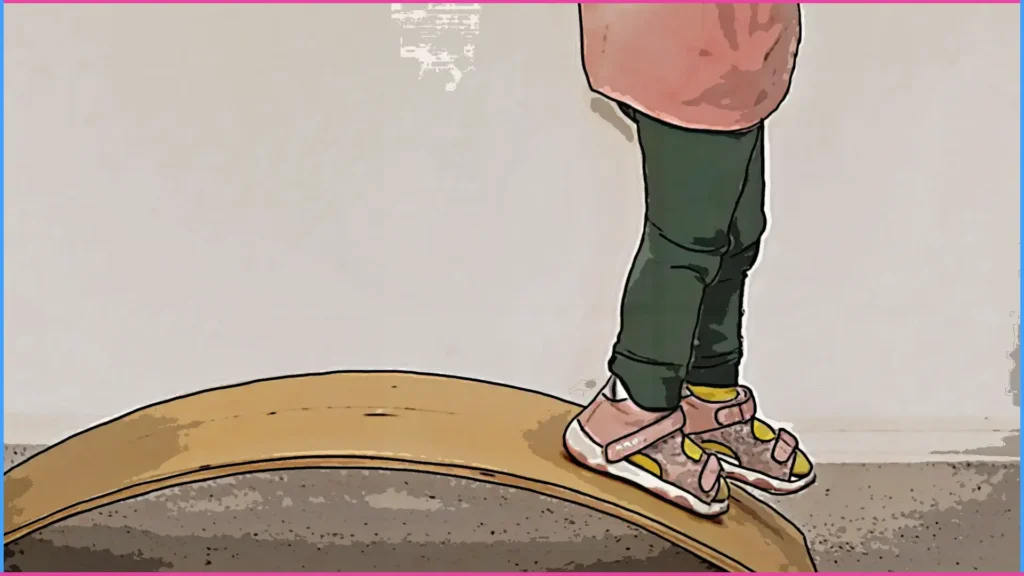 Gyermek egyensúlyozó pallón sétál